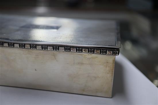 A modern silver cigarette box, by Cooper Brothers & Sons, Sheffield, 1973, 15cm.